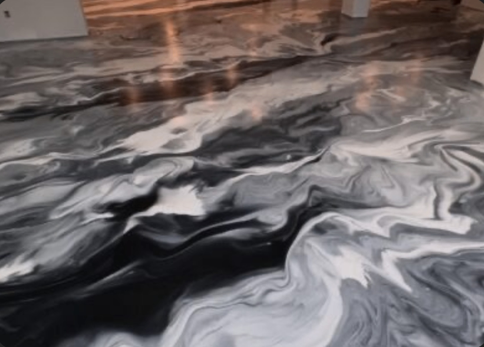 Black and white marbled metallic epoxy floor