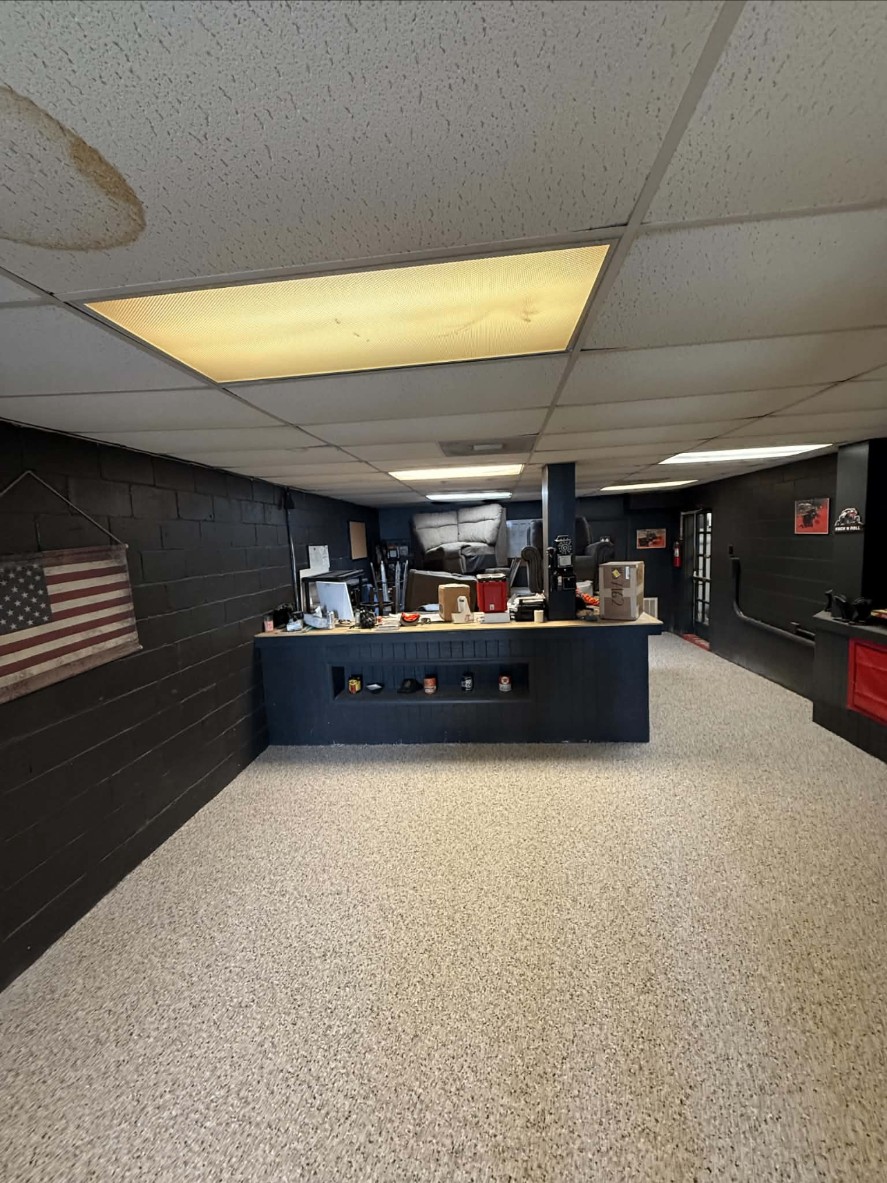 Coyote epoxy floor installed by Elite Epoxy Solutions